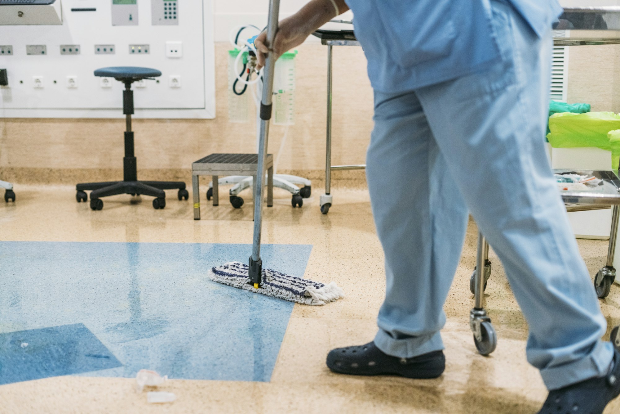 Concept photo of A hospital worker doing cleaning in operation room